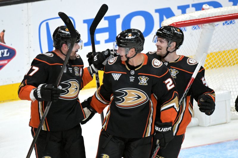 Mar 21, 2024; Anaheim, California, USA;  Anaheim Ducks left wing Alex Killorn (17) is congratulated by defenseman Gustav Lindstrom (28) and defenseman Urho Vaakanainen (5) after scoring a goal in the second period at Honda Center. Mandatory Credit: Jayne Kamin-Oncea-USA TODAY Sports