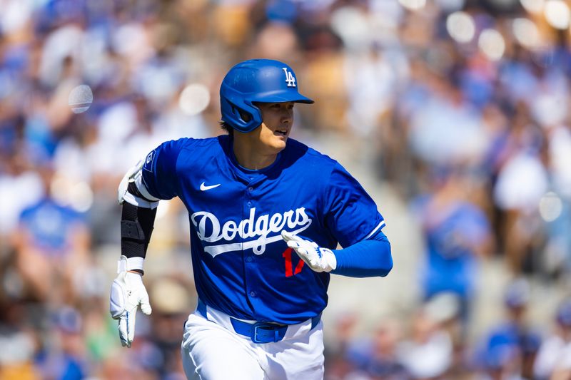 Mar 3, 2024; Phoenix, Arizona, USA; Los Angeles Dodgers designated hitter Shohei Ohtani against the Colorado Rockies during a spring training game at Camelback Ranch-Glendale. Mandatory Credit: Mark J. Rebilas-USA TODAY Sports