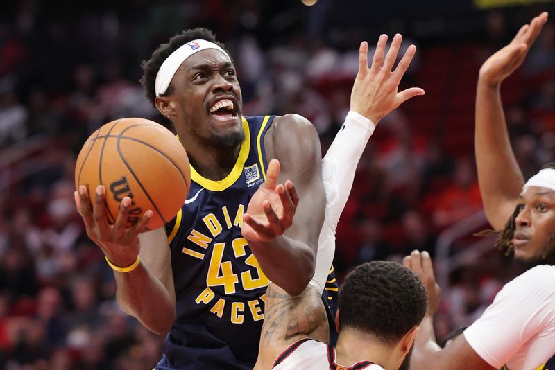 HOUSTON, TEXAS - NOVEMBER 20: Pascal Siakam #43 of the Indiana Pacers shoots against Fred VanVleet #5 of the Houston Rockets during the first half at Toyota Center on November 20, 2024 in Houston, Texas. NOTE TO USER: User expressly acknowledges and agrees that, by downloading and or using this photograph, User is consenting to the terms and conditions of the Getty Images License Agreement. (Photo by Alex Slitz/Getty Images)