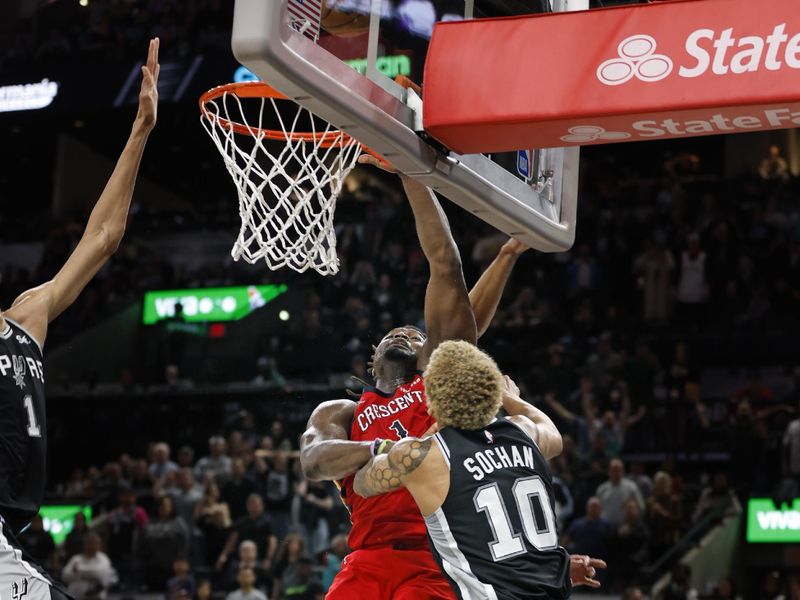 SAN ANTONIO, TX - FEBRUARY  2:  Zion Williamson #1 of the New Orleans Pelicans scores over Jeremy Sochan #10 of the San Antonio Spurs for the winning basket in the second half at Frost Bank Center on February  2, 2024 in San Antonio, Texas. NOTE TO USER: User expressly acknowledges and agrees that, by downloading and or using this photograph, User is consenting to terms and conditions of the Getty Images License Agreement. (Photo by Ronald Cortes/Getty Images)