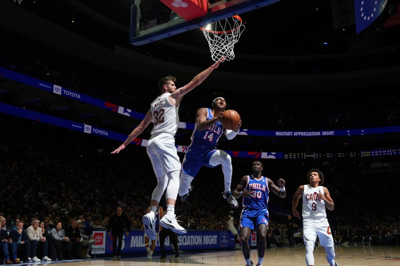 PHILADELPHIA, PA - NOVEMBER 13: Ricky Council IV #14 of the Philadelphia 76ers drives to the basket during the game against the Cleveland Cavaliers on November 13, 2024 at the Wells Fargo Center in Philadelphia, Pennsylvania NOTE TO USER: User expressly acknowledges and agrees that, by downloading and/or using this Photograph, user is consenting to the terms and conditions of the Getty Images License Agreement. Mandatory Copyright Notice: Copyright 2024 NBAE (Photo by Jesse D. Garrabrant/NBAE via Getty Images)