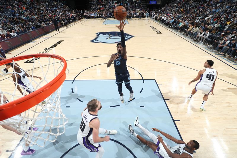 MEMPHIS, TN - JANUARY 29:  Jaren Jackson Jr. #13 of the Memphis Grizzlies drives to the basket during the game against the Sacramento Kings on January 29, 2024 at FedExForum in Memphis, Tennessee. NOTE TO USER: User expressly acknowledges and agrees that, by downloading and or using this photograph, User is consenting to the terms and conditions of the Getty Images License Agreement. Mandatory Copyright Notice: Copyright 2024 NBAE (Photo by Joe Murphy/NBAE via Getty Images)