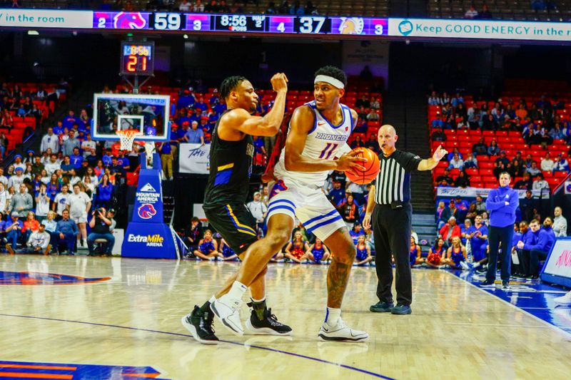 Feb 20, 2024; Boise, Idaho, USA;  Boise State Broncos guard Chibuzo Agbo (11) during the second half against the San Jose State Spartans at ExtraMile Arena. Mandatory Credit: Brian Losness-USA TODAY Sports


