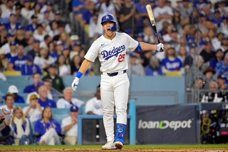Oct 20, 2024; Los Angeles, California, USA; Los Angeles Dodgers shortstop Tommy Edman (25) reacts after hitting a two run home run in the third inning against the New York Mets during game six of the NLCS for the 2024 MLB playoffs at Dodger Stadium. Mandatory Credit: Jayne Kamin-Oncea-Imagn Images