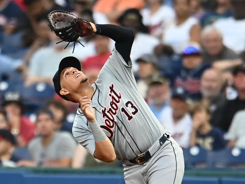 Jul 22, 2024; Cleveland, Ohio, USA; Detroit Tigers first baseman Gio Urshela (13) catches a ball hit by Cleveland Guardians catcher Austin Hedges (not pictured) during the sixth inning at Progressive Field. Mandatory Credit: Ken Blaze-USA TODAY Sports