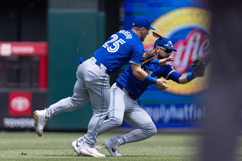 May 8, 2024; Philadelphia, Pennsylvania, USA; Toronto Blue Jays outfielder Kevin Kiermaier (39) makes a catch for an out while colliding with outfielder Daulton Varsho (25) during the first inning against the Philadelphia Phillies at Citizens Bank Park. Mandatory Credit: Bill Streicher-USA TODAY Sports