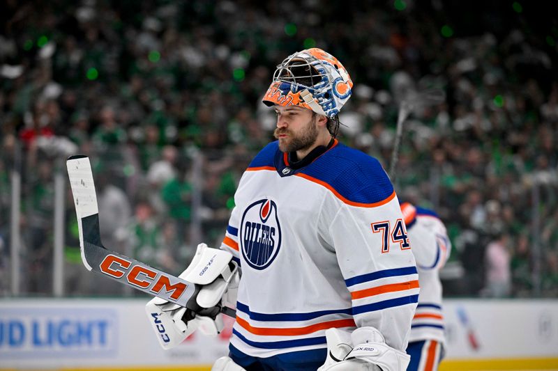 May 23, 2024; Dallas, Texas, USA; Edmonton Oilers goaltender Stuart Skinner (74) skates back on the ice during the overtime period against the Dallas Stars n game one of the Western Conference Final of the 2024 Stanley Cup Playoffs at American Airlines Center. Mandatory Credit: Jerome Miron-USA TODAY Sports