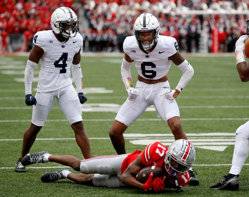 Oct 21, 2023; Columbus, Ohio, USA;  Penn State Nittany Lions safety Zakee Wheatley (6) celebrates after a fourth down tackle of Ohio State Buckeyes wide receiver Carnell Tate (17) during the third quarter at Ohio Stadium. Mandatory Credit: Joseph Maiorana-USA TODAY Sports