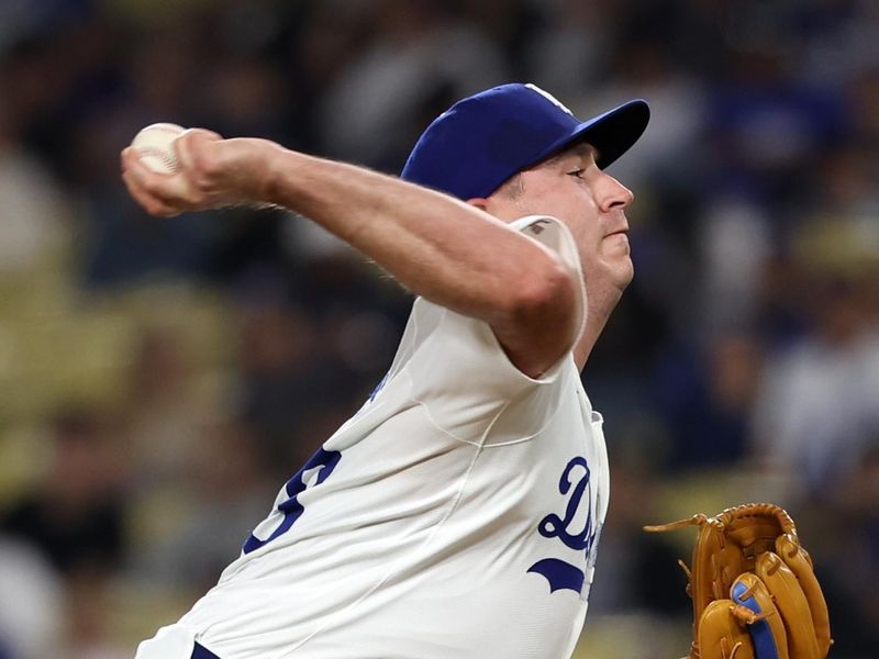 Jun 1, 2024; Los Angeles, California, USA;  Los Angeles Dodgers relief pitcher Evan Phillips (59) pitches during the ninth inning against the Colorado Rockies at Dodger Stadium. Mandatory Credit: Kiyoshi Mio-USA TODAY Sports