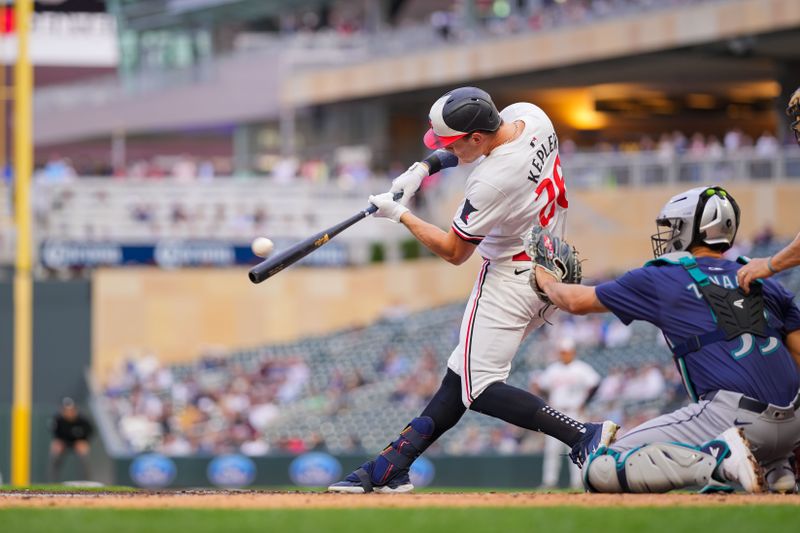 May 7, 2024; Minneapolis, Minnesota, USA; Minnesota Twins catcher Ryan Jeffers (27) doubles against the Seattle Mariners in the third inning at Target Field. Mandatory Credit: Brad Rempel-USA TODAY Sports