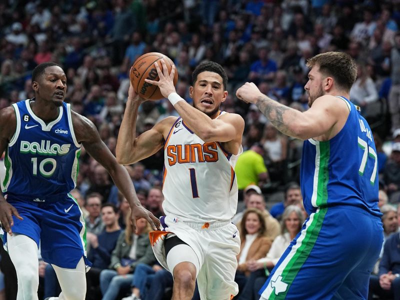 DALLAS, TX - DECEMBER 5: Devin Booker #1 of the Phoenix Suns drives to the basket during the game against the Dallas Mavericks on December 5, 2022 at the American Airlines Center in Dallas, Texas. NOTE TO USER: User expressly acknowledges and agrees that, by downloading and or using this photograph, User is consenting to the terms and conditions of the Getty Images License Agreement. Mandatory Copyright Notice: Copyright 2022 NBAE (Photo by Glenn James/NBAE via Getty Images)