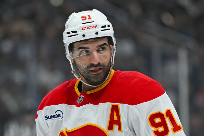 Feb 28, 2026; Los Angeles, California, USA; Calgary Flames center Nazem Kadri (91) is seen on the ice during the first period against the Los Angeles Kings at Crypto.com Arena. Mandatory Credit: Griffin Hooper-Imagn Images