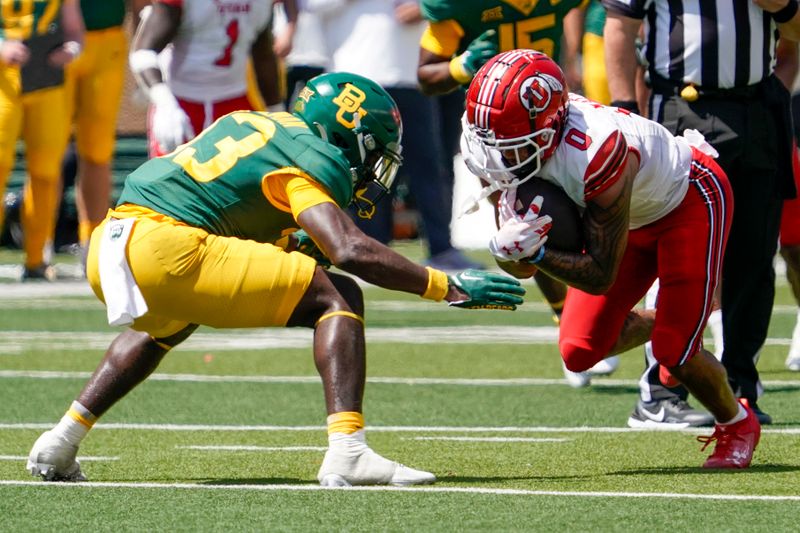 Sep 9, 2023; Waco, Texas, USA; Utah Utes wide receiver Mikey Matthews (0) runs past Baylor Bears safety DJ Coleman (33) during the second half at McLane Stadium. Mandatory Credit: Raymond Carlin III-USA TODAY Sports