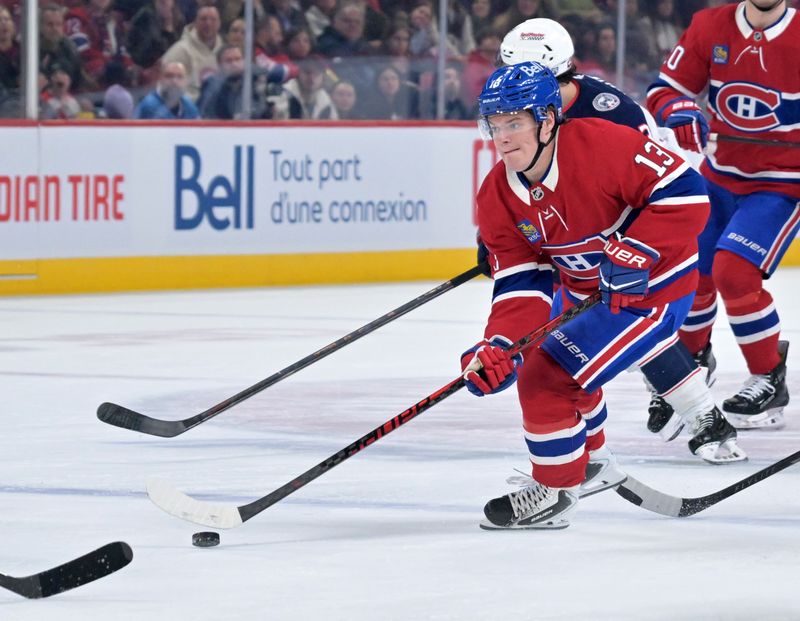 Mar 26, 2026; Montreal, Quebec, CAN; Montreal Canadiens forward Cole Caufield (13) plays the puck during the second period of the game against the Columbus Blue Jackets at the Bell Centre. Mandatory Credit: Eric Bolte-Imagn Images Mar 26, 2026; Montreal, Quebec, CAN; Montreal Canadiens forward Cole Caufield (13) plays the puck during the second period of the game against the Columbus Blue Jackets at the Bell Centre. Mandatory Credit: Eric Bolte-Imagn Images