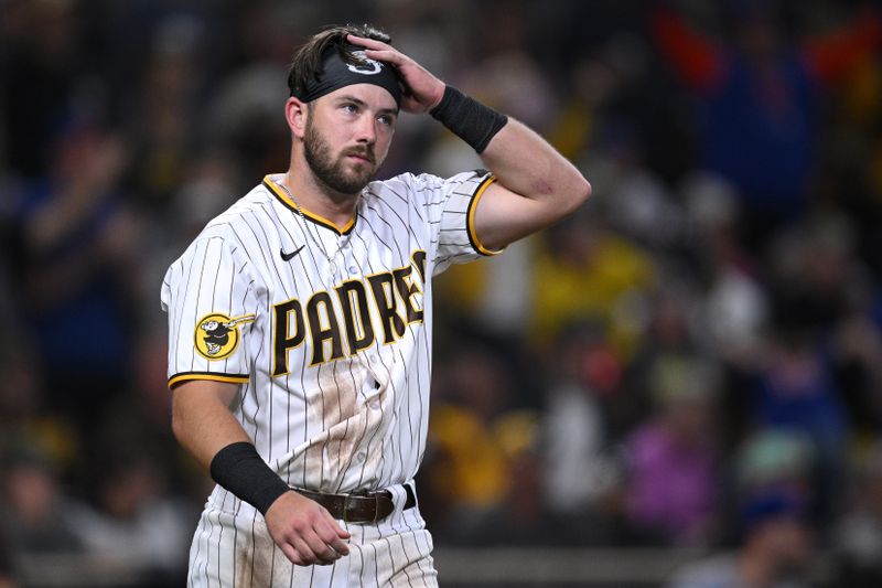 Jul 8, 2023; San Diego, California, USA; San Diego Padres second baseman Matthew Batten (17) looks on after striking out to end the sixth inning against the New York Mets at Petco Park. Mandatory Credit: Orlando Ramirez-USA TODAY Sports