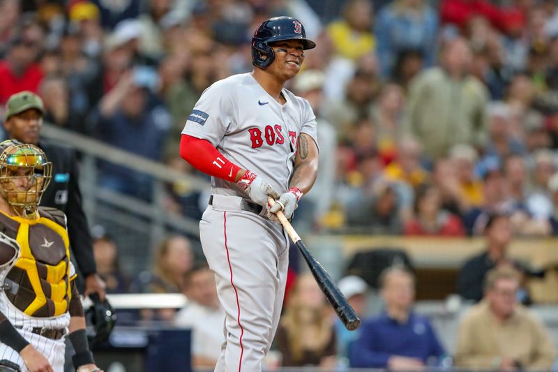 May 20, 2023; San Diego, California, USA;  Boston Red Sox third baseman Rafael Devers (11) watches the ball as he just misses a home run in the first inning against the San Diego Padres at Petco Park. Mandatory Credit: David Frerker-USA TODAY Sports