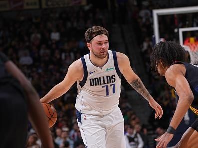 DENVER, CO - DECEMBER 18: Luka Doncic #77 of the Dallas Mavericks handles the ball during the game against the Denver Nuggets on December 18, 2023 at the Ball Arena in Denver, Colorado. NOTE TO USER: User expressly acknowledges and agrees that, by downloading and/or using this Photograph, user is consenting to the terms and conditions of the Getty Images License Agreement. Mandatory Copyright Notice: Copyright 2023 NBAE (Photo by Bart Young/NBAE via Getty Images)