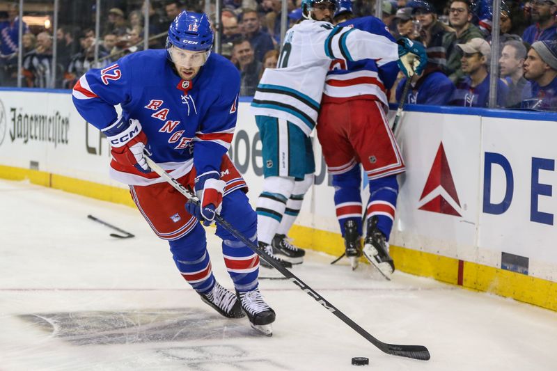 Dec 3, 2023; New York, New York, USA;  New York Rangers center Nick Bonino (12) controls the puck in the first period against the San Jose Sharks at Madison Square Garden. Mandatory Credit: Wendell Cruz-USA TODAY Sports