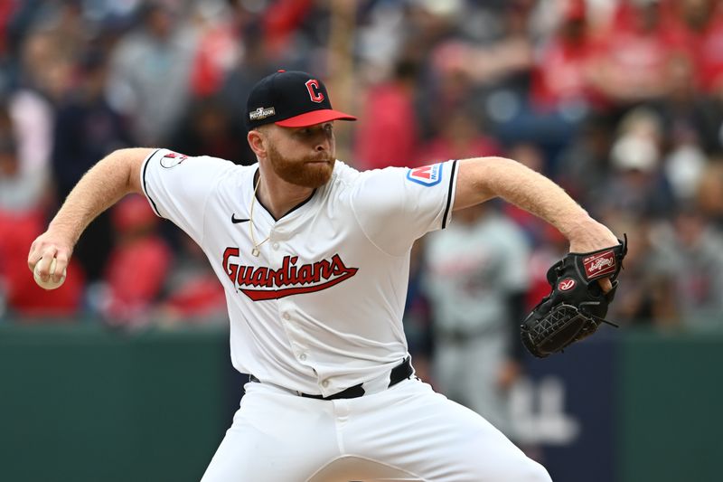 Oct 12, 2024; Cleveland, Ohio, USA; Cleveland Guardians relief pitcher Andrew Walters (63) pitches in the fifth inning against the Detroit Tigers  during game five of the ALDS for the 2024 MLB Playoffs at Progressive Field. Mandatory Credit: Ken Blaze-Imagn Images