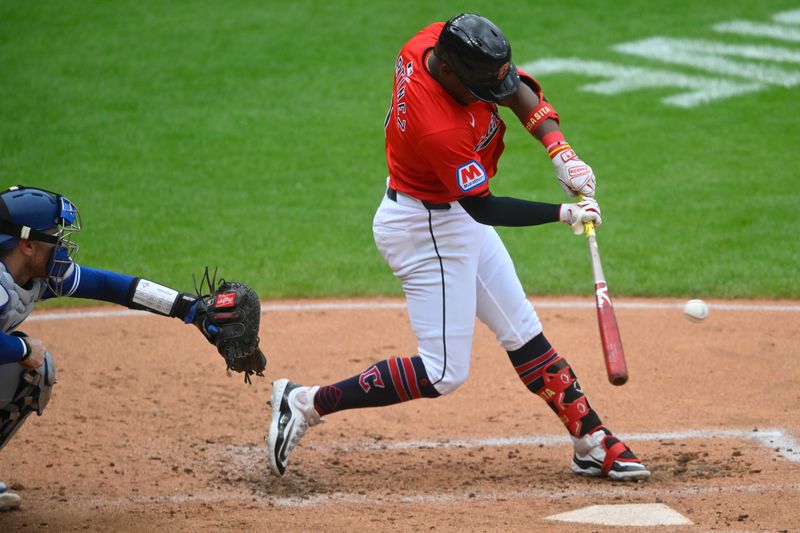 Jun 23, 2024; Cleveland, Ohio, USA; Cleveland Guardians third baseman Angel Martinez (1) singles in the second inning against the Toronto Blue Jays at Progressive Field. Mandatory Credit: David Richard-USA TODAY Sports