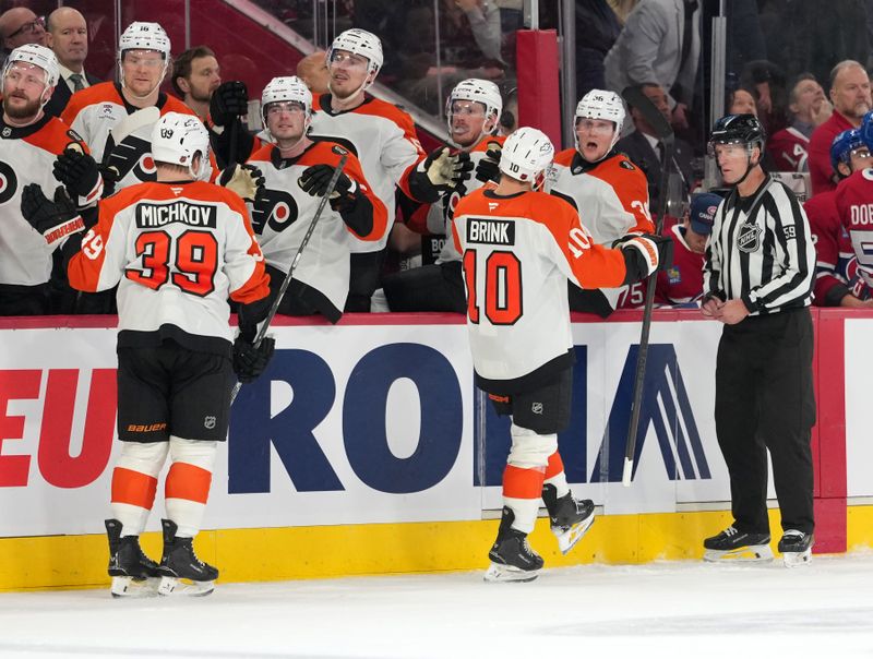 Dec 16, 2025; Montreal, Quebec, CAN; Philadelphia Flyers forward Bobby Brink (10) celebrates with teammates after scoring a goal against the Montreal Canadians during the second period at the Bell Centre. Mandatory Credit: Eric Bolte-Imagn Images