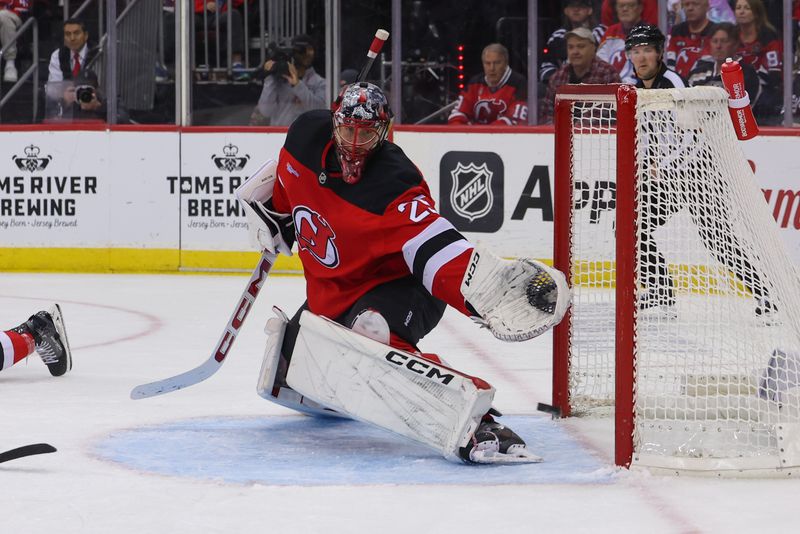 Oct 27, 2024; Newark, New Jersey, USA; New Jersey Devils goaltender Jacob Markstrom (25) defends his net against the Anaheim Ducks during the third period at Prudential Center. Mandatory Credit: Ed Mulholland-Imagn Images