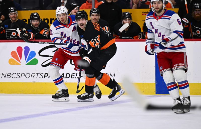 Nov 24, 2023; Philadelphia, Pennsylvania, USA; Philadelphia Flyers center Ryan Poehling (25) reacts to a pass from New York Rangers left wing Artemi Panarin (10) in the third period at Wells Fargo Center. Mandatory Credit: Kyle Ross-USA TODAY Sports