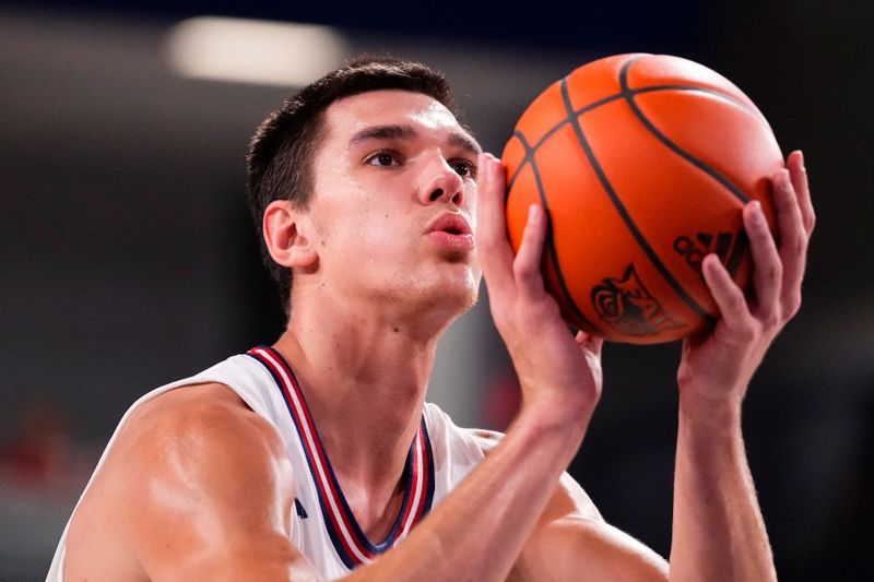 Jan 2, 2024; Boca Raton, Florida, USA; Florida Atlantic Owls center Vladislav Goldin (50) shoots a free throw against the East Carolina Pirates during the second half at Eleanor R. Baldwin Arena. Mandatory Credit: Rich Storry-USA TODAY Sports