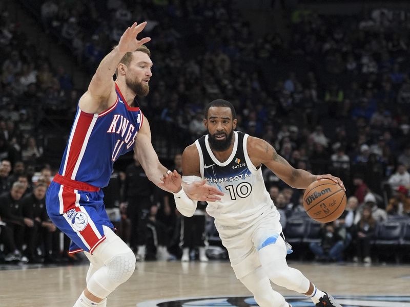 MINNEAPOLIS, MN -  NOVEMBER 27:  Mike Conley #10 of the Minnesota Timberwolves drives to the basket during the game against the Sacramento Kings on November 27, 2024 at Target Center in Minneapolis, Minnesota. NOTE TO USER: User expressly acknowledges and agrees that, by downloading and or using this Photograph, user is consenting to the terms and conditions of the Getty Images License Agreement. Mandatory Copyright Notice: Copyright 2024 NBAE (Photo by Jordan Johnson/NBAE via Getty Images)