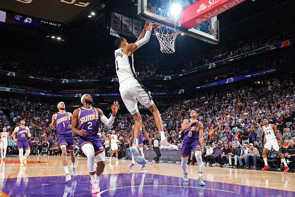 PHOENIX, AZ - NOVEMBER 2: Victor Wembanyama #1 of the San Antonio Spurs dunks the ball during the game against the Phoenix Suns on November 2, 2023 at Footprint Center in Phoenix, Arizona. NOTE TO USER: User expressly acknowledges and agrees that, by downloading and or using this photograph, user is consenting to the terms and conditions of the Getty Images License Agreement. Mandatory Copyright Notice: Copyright 2023 NBAE (Photo by Garrett Ellwood/NBAE via Getty Images)