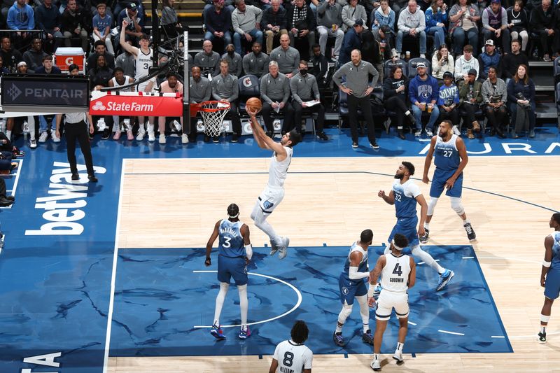 MINNEAPOLIS, MN -  FEBRUARY 28: Santi Aldama #7 of the Memphis Grizzlies goes to the basket during the game on February 28, 2024 at Target Center in Minneapolis, Minnesota. NOTE TO USER: User expressly acknowledges and agrees that, by downloading and or using this Photograph, user is consenting to the terms and conditions of the Getty Images License Agreement. Mandatory Copyright Notice: Copyright 2024 NBAE (Photo by David Sherman/NBAE via Getty Images)