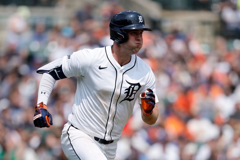 Jun 8, 2025; Detroit, Michigan, USA;  Detroit Tigers outfielder Kerry Carpenter (30) runs the bases after he hits a double in the fifth inning against the Chicago Cubs at Comerica Park. Mandatory Credit: Rick Osentoski-Imagn Images