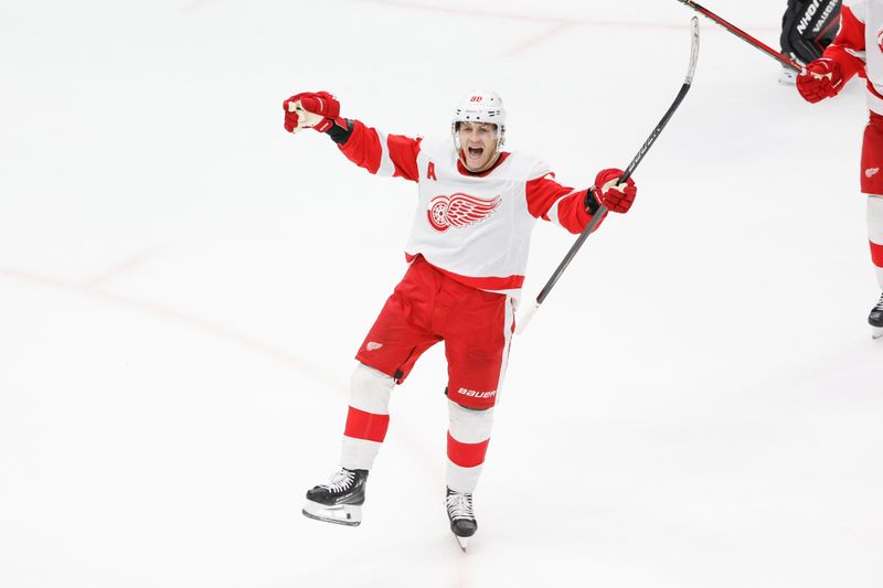 Feb 25, 2024; Chicago, Illinois, USA; Detroit Red Wings right wing Patrick Kane (88) celebrates after scoring game winning goal against the Chicago Blackhawks in overtime at United Center. Mandatory Credit: Kamil Krzaczynski-USA TODAY Sports