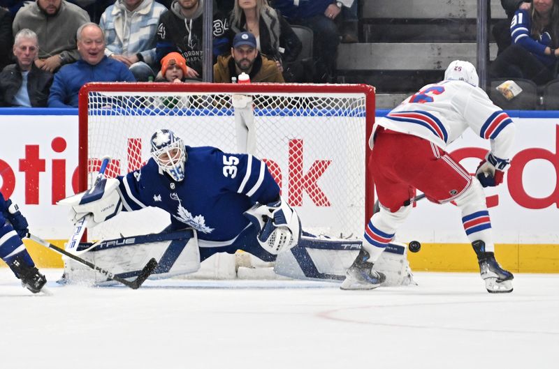 Mar. 2, 2024; Toronto, Ontario, CAN;  Toronto Maple Leafs goalie Ilya Samsonov (35) makes a save on a shot from New York Rangers forward Jimmy Vesey (26) in the first  period at Scotiabank Arena. Mandatory Credit: Dan Hamilton-USA TODAY Sports