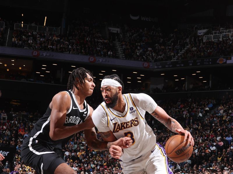 BROOKLYN, NY - MARCH 31: Anthony Davis #3 of the Los Angeles Lakers goes to the basket during the game on March 31, 2024 at Barclays Center in Brooklyn, New York. NOTE TO USER: User expressly acknowledges and agrees that, by downloading and or using this Photograph, user is consenting to the terms and conditions of the Getty Images License Agreement. Mandatory Copyright Notice: Copyright 2024 NBAE (Photo by Nathaniel S. Butler/NBAE via Getty Images)