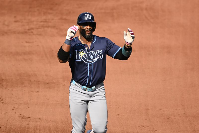 Jun 28, 2025; Baltimore, Maryland, USA; Tampa Bay Rays first baseman Yandy Diaz (2) celebrates while rounding the bases after hitting a home run during the fourth inning against the Baltimore Orioles at Oriole Park at Camden Yards. Mandatory Credit: Rafael Suanes-Imagn Images