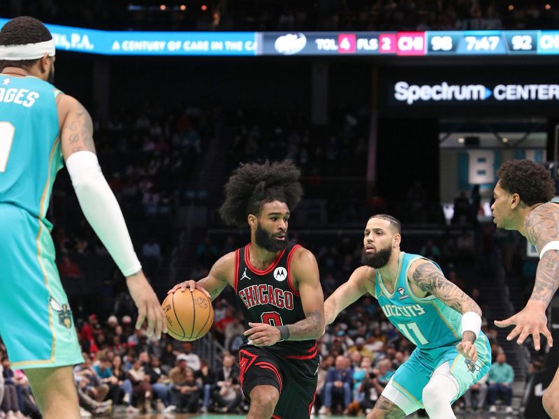 CHARLOTTE, NC - JANUARY 31: Coby White #0 of the Chicago Bulls dribbles the ball during the game against the Charlotte Hornets on January 31, 2024 at Spectrum Center in Charlotte, North Carolina. NOTE TO USER: User expressly acknowledges and agrees that, by downloading and or using this photograph, User is consenting to the terms and conditions of the Getty Images License Agreement.  Mandatory Copyright Notice:  Copyright 2024 NBAE (Photo by Brock Williams-Smith/NBAE via Getty Images)