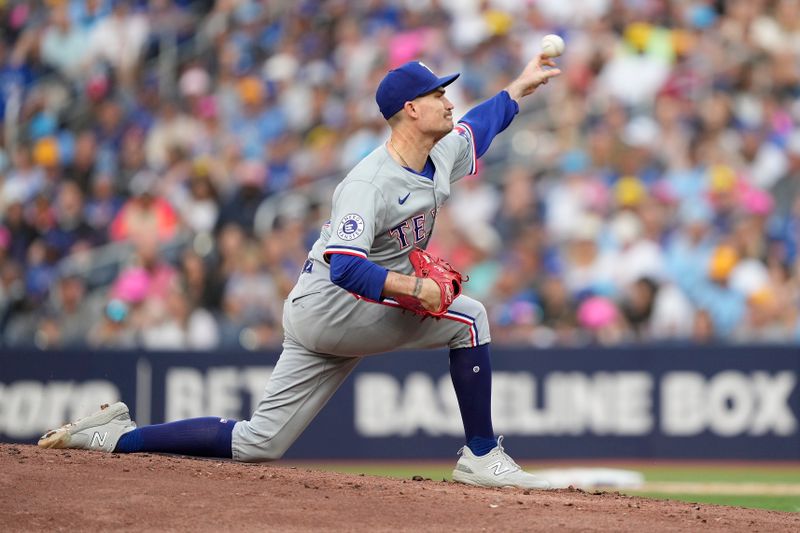 Jul 26, 2024; Toronto, Ontario, CAN; Toronto Blue Jays pitcher Bowden Francis (44) pitches to the Toronto Blue Jays during the first inning at Rogers Centre. Mandatory Credit: John E. Sokolowski-USA TODAY Sports