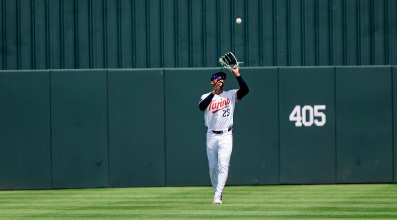 Mar 22, 2025; Fort Myers, Florida, USA; Minnesota Twins Byron Buxton (25) catches a fly ball in the fourth inning of their game against the Toronto Blue Jays at Lee Health Sports Complex. Mandatory Credit: Chris Tilley-Imagn Images