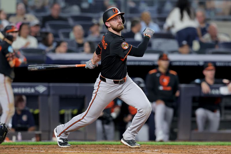 Sep 26, 2025; Bronx, New York, USA; Baltimore Orioles third baseman Jordan Westburg (11) follows through on a single against the New York Yankees during the fifth inning at Yankee Stadium. Mandatory Credit: Brad Penner-Imagn Images