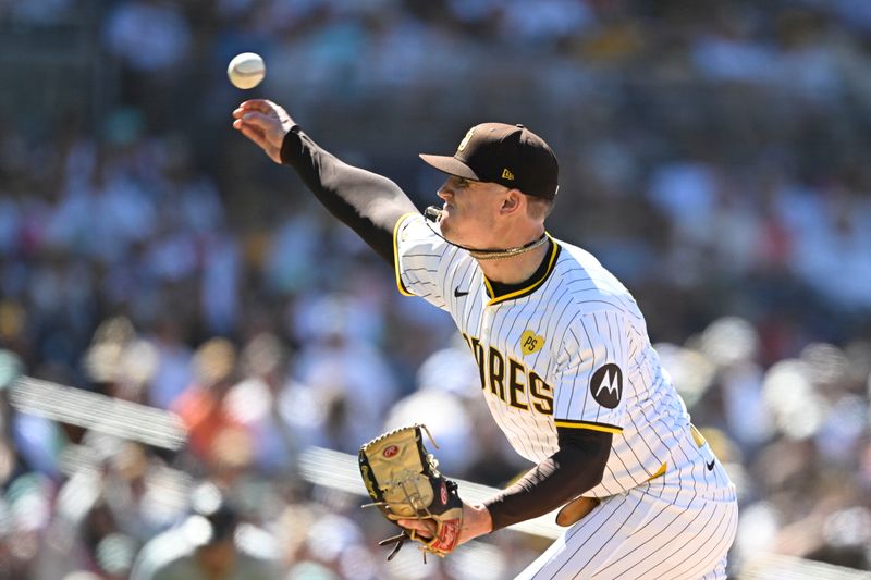 August 14, 2024; San Diego, California, USA; San Diego Padres pitcher Sean Reynolds (25) delivers against the Pittsburgh Pirates during the eighth inning at Petco Park. Mandatory Credit: Denis Poroy-USA TODAY Sports at Petco Park. 