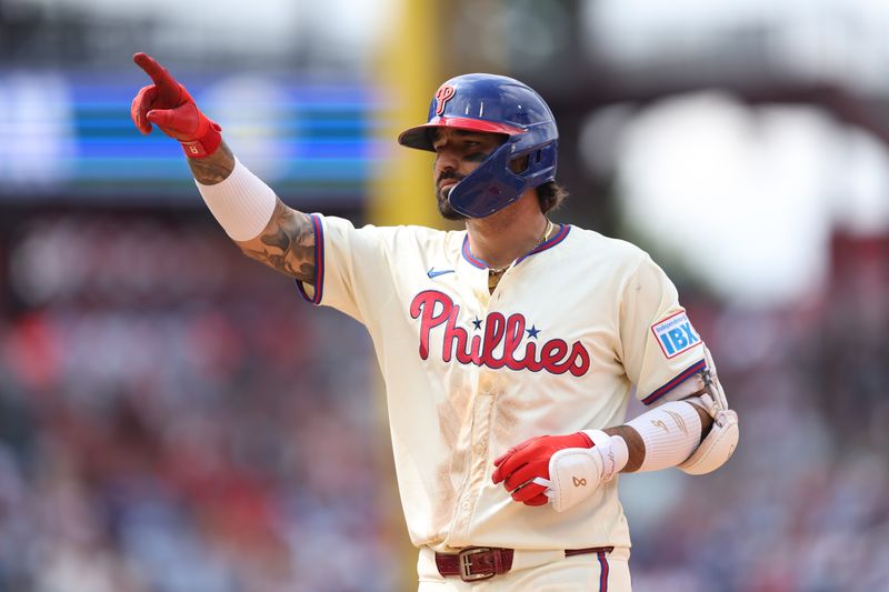 Jul 31, 2024; Philadelphia, Pennsylvania, USA;  Philadelphia Phillies outfielder Nick Castellanos (8) reacts after hitting an RBI single during the eighth inning against the New York Yankees at Citizens Bank Park. Mandatory Credit: Bill Streicher-USA TODAY Sports