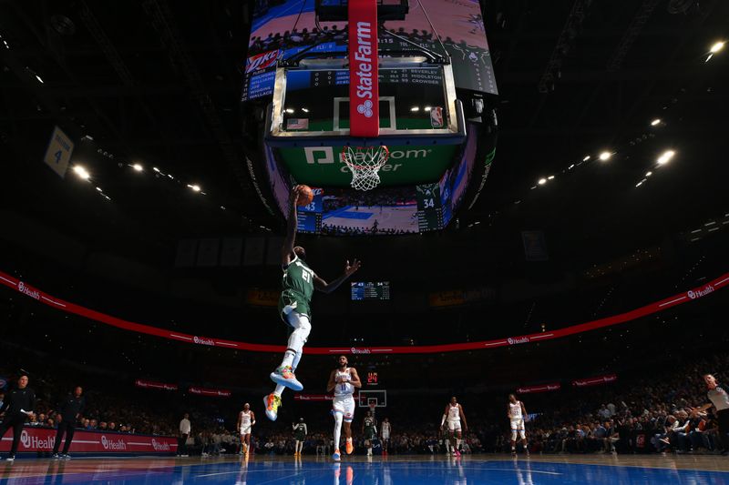 OKLAHOMA CITY, OK - APRIL 12: Patrick Beverley #21 of the Milwaukee Bucks drives to the basket during the game against the Oklahoma City Thunder on April 12, 2024 at Paycom Arena in Oklahoma City, Oklahoma. NOTE TO USER: User expressly acknowledges and agrees that, by downloading and or using this photograph, User is consenting to the terms and conditions of the Getty Images License Agreement. Mandatory Copyright Notice: Copyright 2024 NBAE (Photo by Zach Beeker/NBAE via Getty Images)