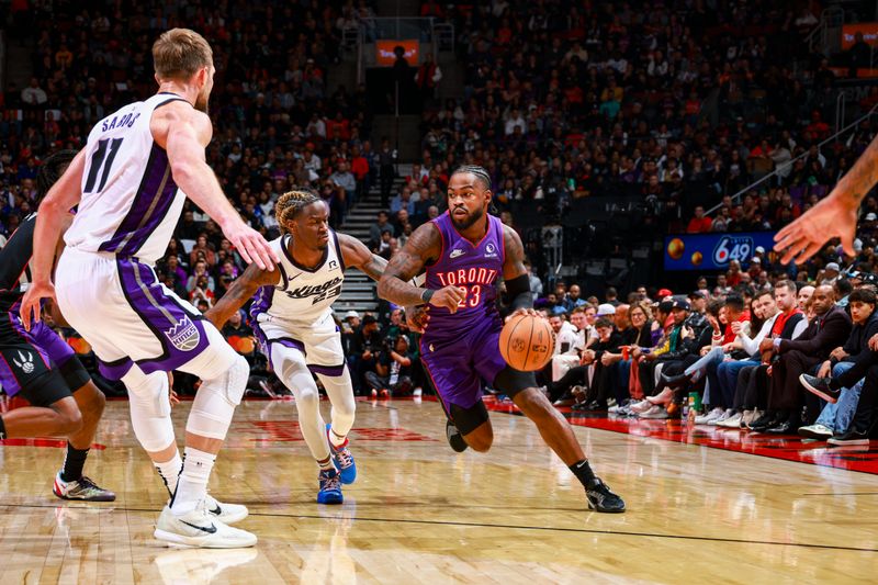 TORONTO, CANADA - NOVEMBER 2: Jamal Shead #23 of the Toronto Raptors drives to the basket during the game against the Sacramento Kings on November 2, 2024 at the Scotiabank Arena in Toronto, Ontario, Canada.  NOTE TO USER: User expressly acknowledges and agrees that, by downloading and or using this Photograph, user is consenting to the terms and conditions of the Getty Images License Agreement.  Mandatory Copyright Notice: Copyright 2024 NBAE (Photo by Vaughn Ridley/NBAE via Getty Images)