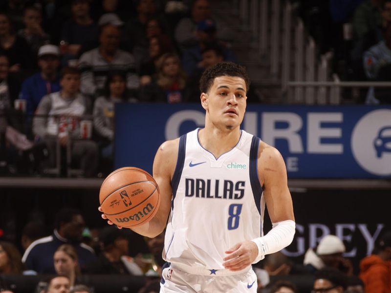 DETROIT, MI - MARCH 9: Josh Green #8 of the Dallas Mavericks dribbles the ball during the game against the Detroit Pistons on March 9, 2024 at Little Caesars Arena in Detroit, Michigan. NOTE TO USER: User expressly acknowledges and agrees that, by downloading and/or using this photograph, User is consenting to the terms and conditions of the Getty Images License Agreement. Mandatory Copyright Notice: Copyright 2024 NBAE (Photo by Brian Sevald/NBAE via Getty Images)