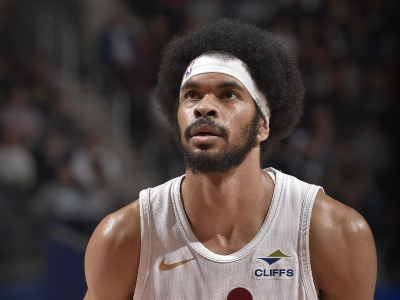 CLEVELAND, OH - JANUARY 27: Jarrett Allen #31 of the Cleveland Cavaliers shoots a free throw during the game against the Detroit Pistons on January 27, 2025 at Rocket Mortgage FieldHouse in Cleveland, Ohio. NOTE TO USER: User expressly acknowledges and agrees that, by downloading and/or using this Photograph, user is consenting to the terms and conditions of the Getty Images License Agreement. Mandatory Copyright Notice: Copyright 2025 NBAE (Photo by David Liam Kyle/NBAE via Getty Images)