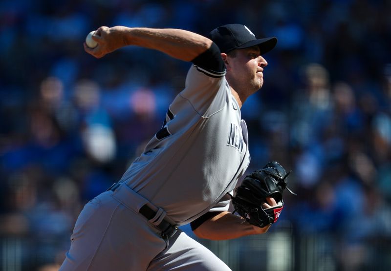 Oct 1, 2023; Kansas City, Missouri, USA; New York Yankees starting pitcher Michael King (34) pitches during the first inning at Kauffman Stadium. Mandatory Credit: Jay Biggerstaff-USA TODAY Sports