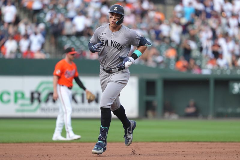 Jul 13, 2024; Baltimore, Maryland, USA; New York Yankees outfielder Aaron Judge (99) rounds the bases following his solo home run in the fifth inning against the Baltimore Orioles at Oriole Park at Camden Yards. Mandatory Credit: Mitch Stringer-USA TODAY Sports