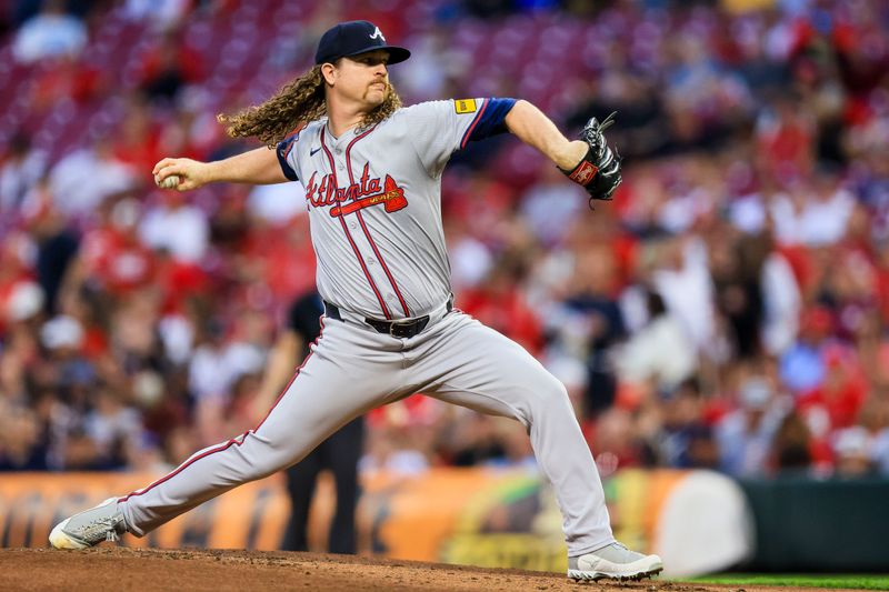 Sep 17, 2024; Cincinnati, Ohio, USA; Atlanta Braves starting pitcher Grant Holmes (66) pitches against the Cincinnati Reds in the first inning at Great American Ball Park. Mandatory Credit: Katie Stratman-Imagn Images