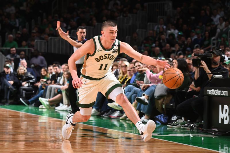 BOSTON, MA - FEBRUARY 9: Payton Pritchard #11 of the Boston Celtics handles the ball during the game against the Washington Wizards on February 9, 2024 at the TD Garden in Boston, Massachusetts. NOTE TO USER: User expressly acknowledges and agrees that, by downloading and or using this photograph, User is consenting to the terms and conditions of the Getty Images License Agreement. Mandatory Copyright Notice: Copyright 2024 NBAE  (Photo by Brian Babineau/NBAE via Getty Images)